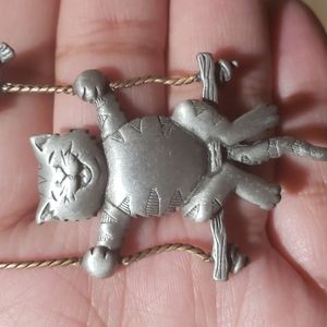 Vintage 1980's swinging cat pin